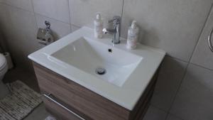 Koupelna v ubytování Settle inn Self Catering Units