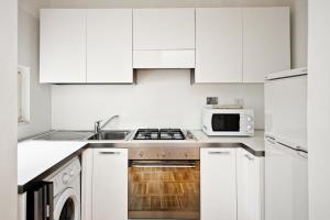 A kitchen or kitchenette at Romacentrarte
