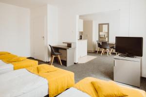 TV a/nebo společenská místnost v ubytování Arche Hotel Siedlce