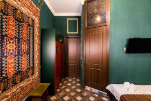 Postel nebo postele na pokoji v ubytování Vorontsoff Inn Boutique Hotel