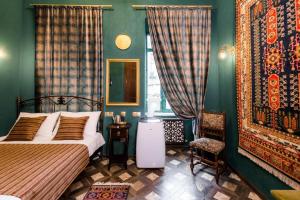 Postel nebo postele na pokoji v ubytování Vorontsoff Inn Boutique Hotel
