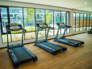 a gym with three treadmills in a room at 16 Sierra Puchong Zentro 5 人 Supreme二房公寓 in Puchong