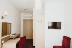 TV a/nebo společenská místnost v ubytování Arche Hotel Siedlce