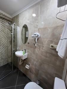 A bathroom at PALMERA ART HOUSE