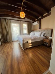 A bed or beds in a room at PALMERA ART HOUSE