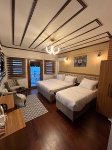 A bed or beds in a room at PALMERA ART HOUSE