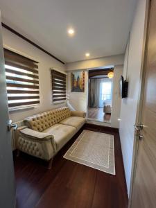 A seating area at PALMERA ART HOUSE