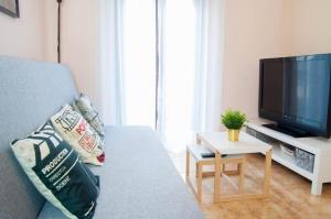 TV a/nebo společenská místnost v ubytování Cáceres de Cine