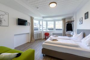Łóżko lub łóżka w pokoju w obiekcie Appartements DAS RETTENBACHER