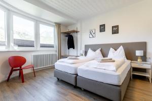 Łóżko lub łóżka w pokoju w obiekcie Appartements DAS RETTENBACHER