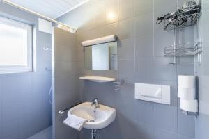 Łazienka w obiekcie Appartements DAS RETTENBACHER