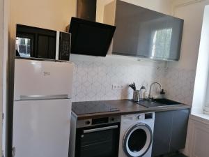 Kuchyňa alebo kuchynka v ubytovaní Nantes, superbe appartement