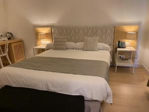 A bed or beds in a room at Sóller Center