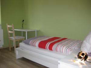 Holiday Home Debacher tesisinde bir odada yatak veya yataklar