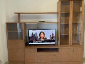 TV a/nebo společenská místnost v ubytování Brunella's Apartment - Beach View