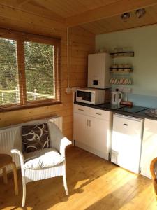 Kuchyň nebo kuchyňský kout v ubytování Cosy cabin for two