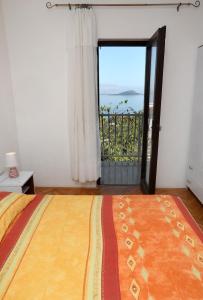 Postel nebo postele na pokoji v ubytování Apartman Karaga