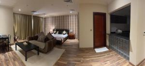 Χώρος καθιστικού στο Wakra Inn Hotel Apartments