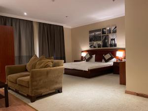 Χώρος καθιστικού στο Wakra Inn Hotel Apartments