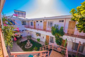 an overhead view of a building with a courtyard at Hotel Montecarlo in Caldera