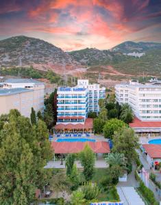 an aerial view of a city with buildings and trees at Blue Fish Hotel in Konaklı