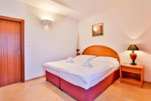 Ліжко або ліжка в номері Hotel Barborka