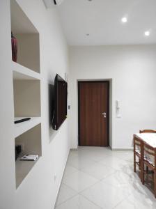 TV a/nebo společenská místnost v ubytování Alpivida Home