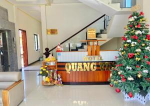 a christmas tree in the lobby of a hotel at Quang Vinh Hồ Tràm in Ho Tram