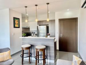 Köök või kööginurk majutusasutuses Amplio condominio ejecutivo con hermosa vista