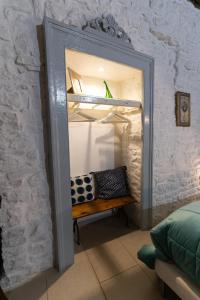 Postel nebo postele na pokoji v ubytování B&B La Torretta