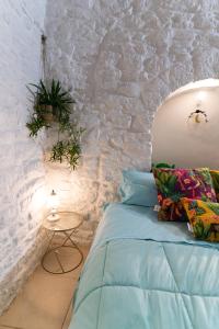Postel nebo postele na pokoji v ubytování B&B La Torretta