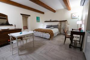 Postel nebo postele na pokoji v ubytování B&B La Torretta