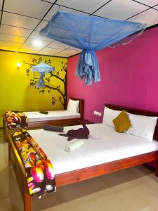Voodi või voodid majutusasutuse Nine Arch Homestay toas