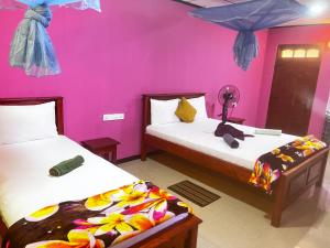 Voodi või voodid majutusasutuse Nine Arch Homestay toas