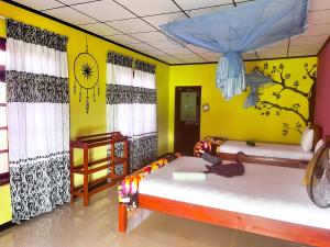 Voodi või voodid majutusasutuse Nine Arch Homestay toas
