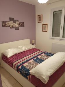 Ένα ή περισσότερα κρεβάτια σε δωμάτιο στο Brigitte