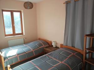 Posteľ alebo postele v izbe v ubytovaní Appartement T4 cosy et familial en bord de pistes