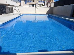 Bazén v ubytovaní Apartamento Eursu centro con piscina alebo v jeho blízkosti