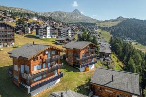 an aerial view of a house in the mountains at Laackerhof in Bettmeralp