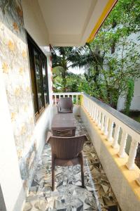 Een balkon of terras bij Sunset & Waves Resort