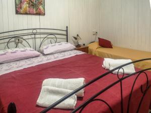 Postel nebo postele na pokoji v ubytování Camping Almoetia