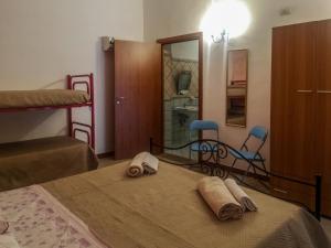 Postel nebo postele na pokoji v ubytování Camping Almoetia