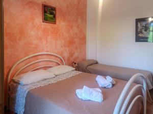 Postel nebo postele na pokoji v ubytování Camping Almoetia