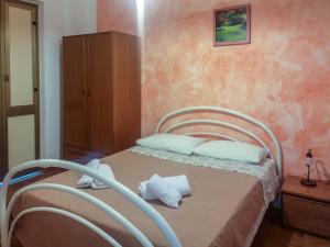 Postel nebo postele na pokoji v ubytování Camping Almoetia