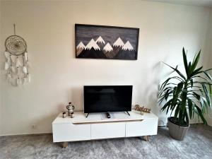 A television and/or entertainment centre at TATRANSKY DOM sk