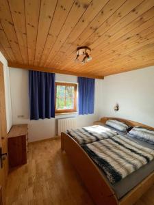 Postelja oz. postelje v sobi nastanitve Alpine cottage with exceptional view