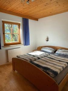 Postelja oz. postelje v sobi nastanitve Alpine cottage with exceptional view