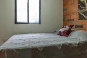 Postel nebo postele na pokoji v ubytování APARTAMENTO MI REFUGIO