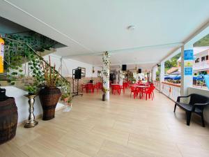 Posezení v ubytování Hotel Caribe La Vega