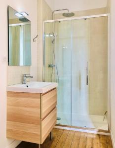 a bathroom with a sink and a shower at Château Fauchey in Cardan